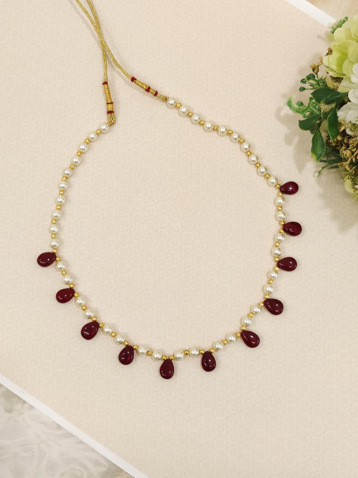 Pearl String Necklace With Drop Shaped Beads