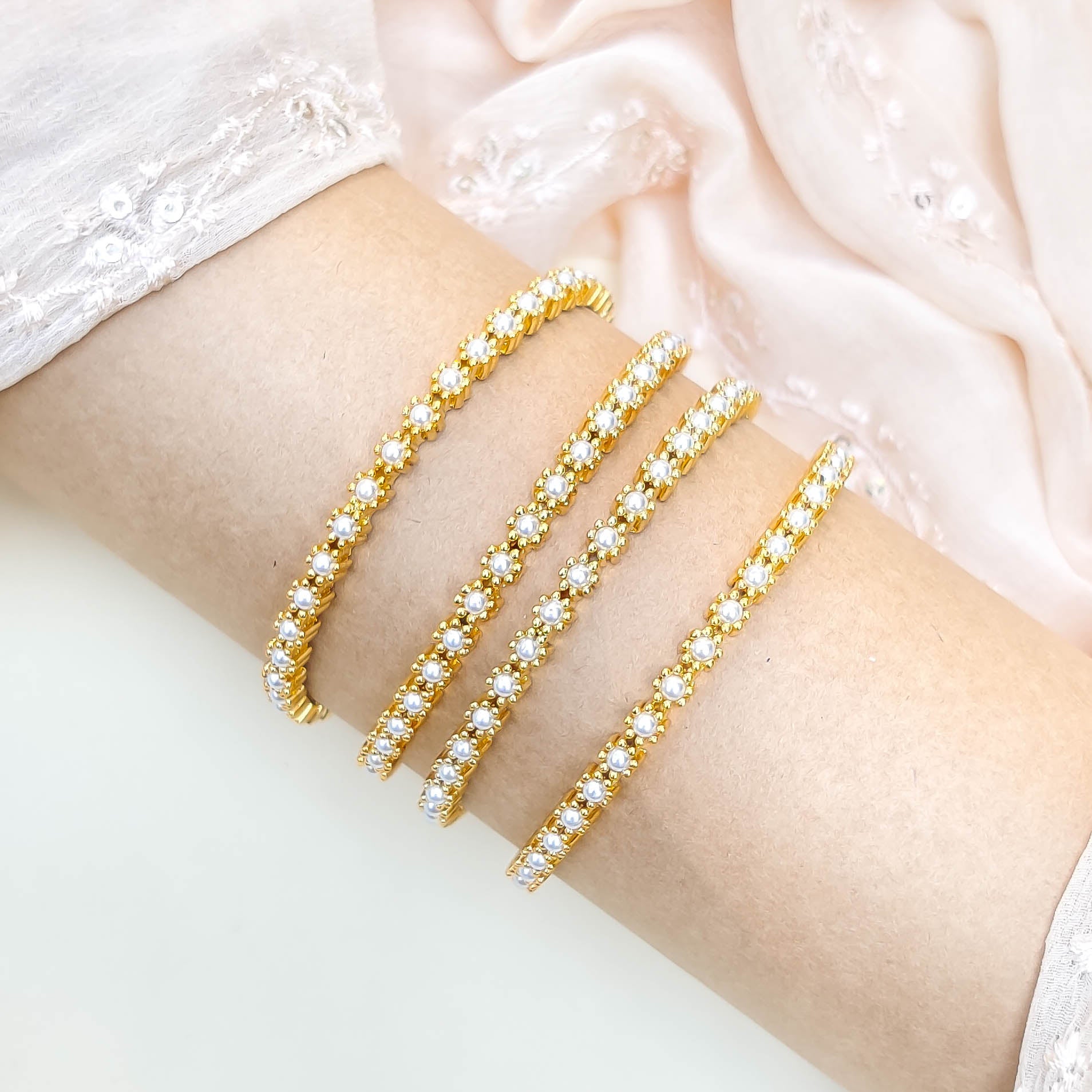 Tiny Pearl Bangles